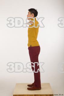 Whole body yellow sweater red trousers brown shoes modeling t…
